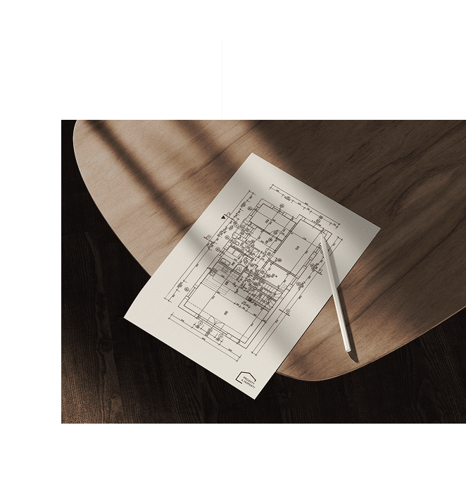 Plán budovy na dřevěném stole
